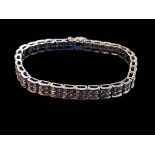 Diamond bracelet made up of 31 four stone collets each weighing approximately 0.