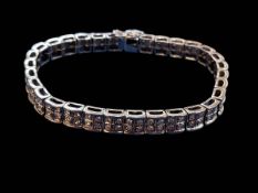 Diamond bracelet made up of 31 four stone collets each weighing approximately 0.