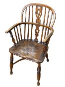 Antique Windsor pierced splat back elbow chair with crinoline stretcher.