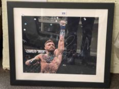 Framed Conor McGregor signed poster photo, framed with COA.