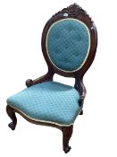 Victorian style mahogany spoon back nursing chair.