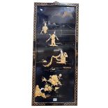 Two Oriental black lacquered panels with applied figure decoration, largest 92cm by 40.5cm.