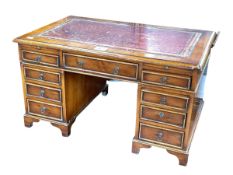 (WITHDRAWN) Walnut nine drawer apprentice pedestal desk, 28.5cm by 51.5cm by 32.5cm.