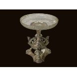 Victorian electroplate centre piece with winged mask supports and engraved glass bowl, 24cm high.