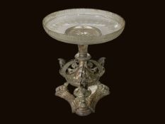 Victorian electroplate centre piece with winged mask supports and engraved glass bowl, 24cm high.