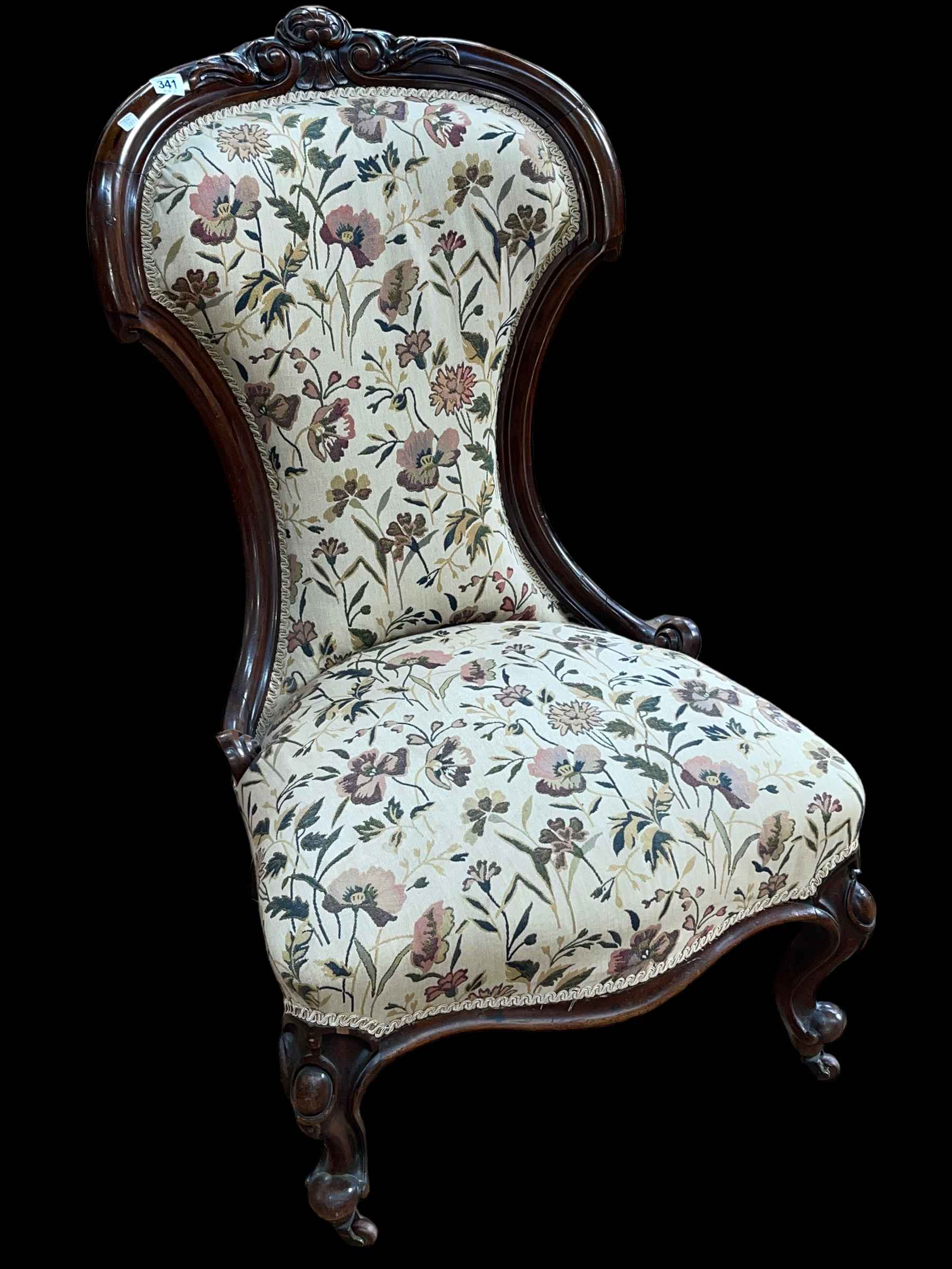 Victorian mahogany framed nursing chair in floral tapestry fabric.