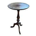 Mahogany tripod wine table, 58cm by 40cm diameter.