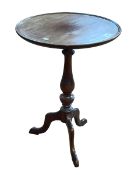 Mahogany tripod wine table, 58cm by 40cm diameter.