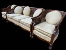 Early 20th Century Bergere panelled three piece lounge suite with ball and claw arm terminals and