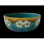 Minton Secessionist bowl decorated with daisy on turquoise ground, number 32, c1910.