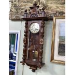 Fattorini & Sons, Bradford, Victorian walnut cased double weight Vienna style wall clock, 118cm.