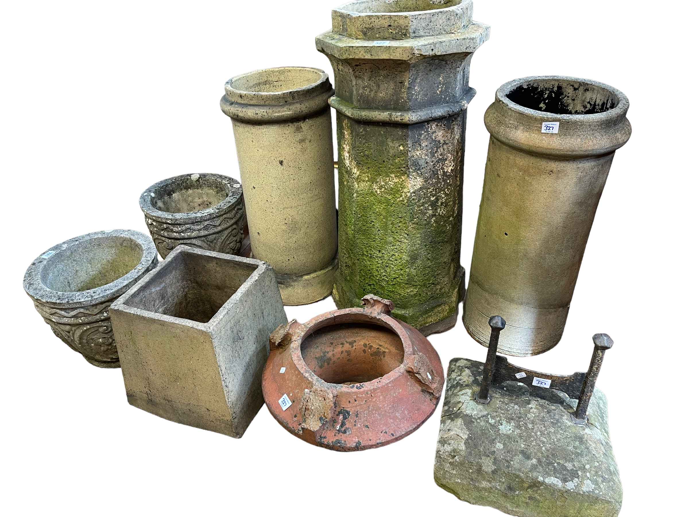 Three various chimney pots, two tops, pair planters and footscraper (8).
