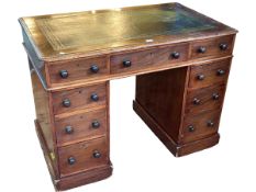 Victorian mahogany nine drawer pedestal desk, 74cm by 99cm by 61cm.