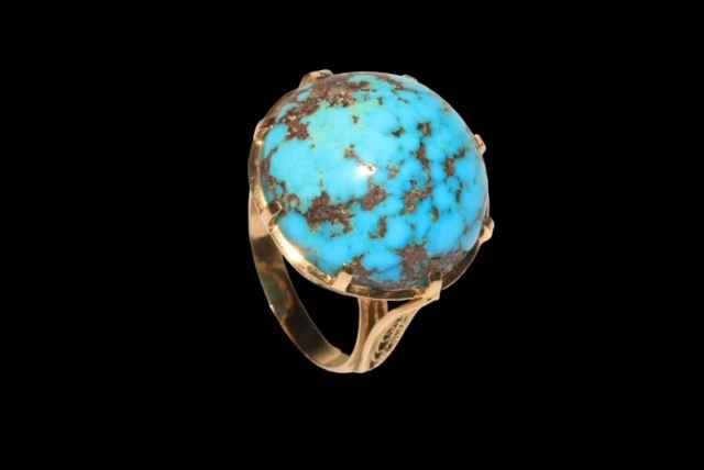 Large circular turquoise stone ring in gold setting (marks worn), size O. - Image 2 of 2