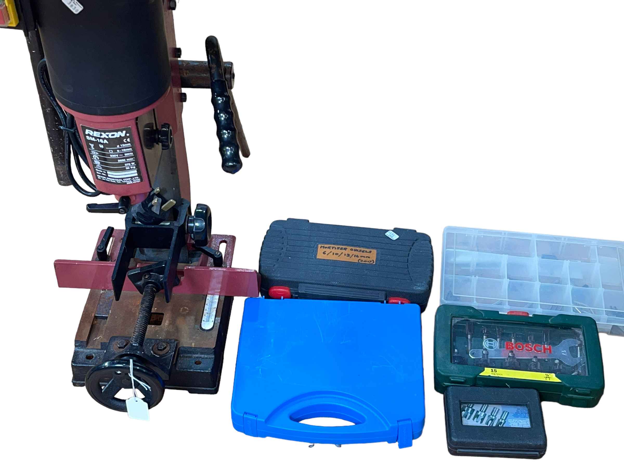 Rexon Router with tools and accessories.