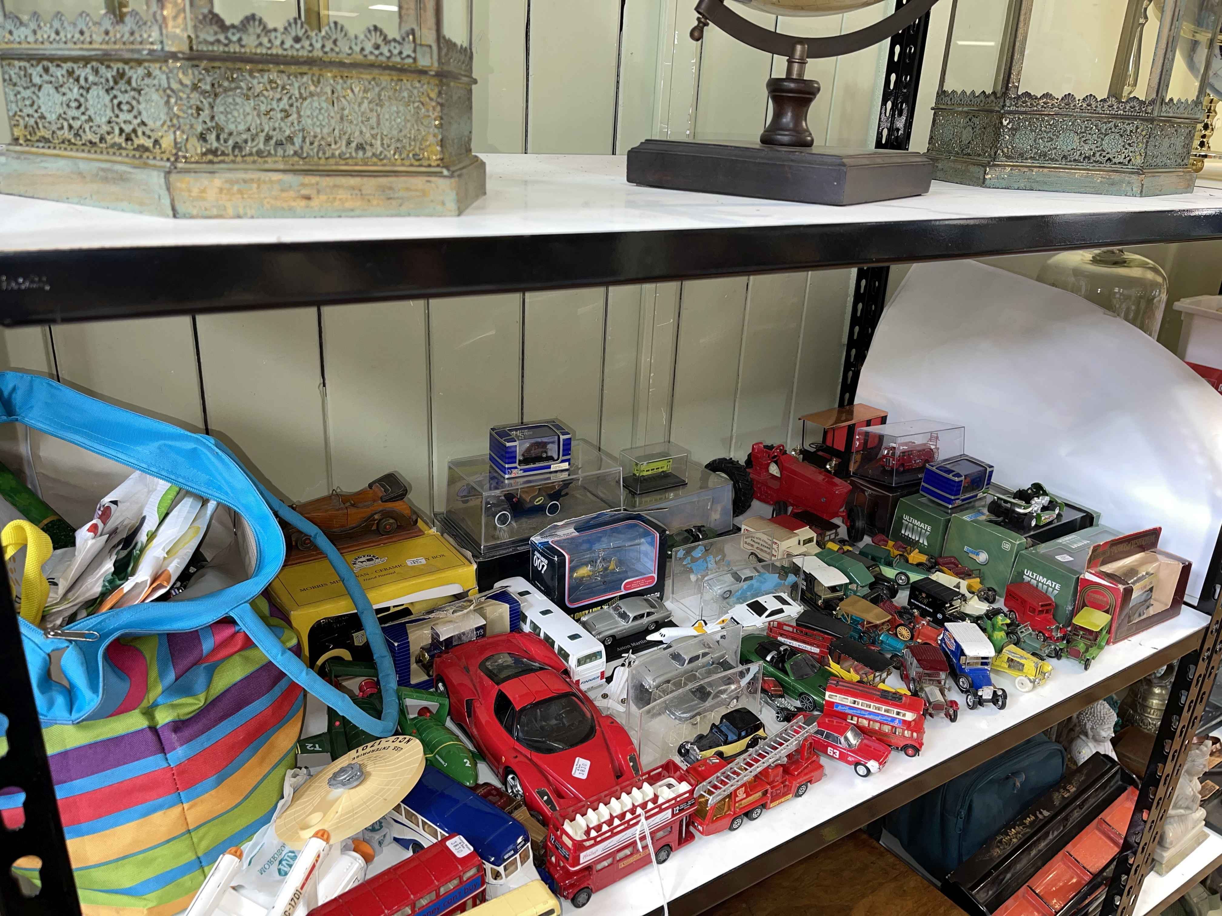 Collection of Diecast toy vehicles including Star Wars, Thunderbirds, etc.