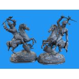 Pair of spelter warriors on horseback, 52cm high.