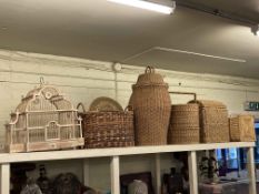 Collection of wicker baskets, wooden sculptures, cages, ornate pottery vases, hanging lantern,