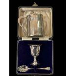 Georgian silver christening mug, London 1800, silver egg cup and spoon, boxed.