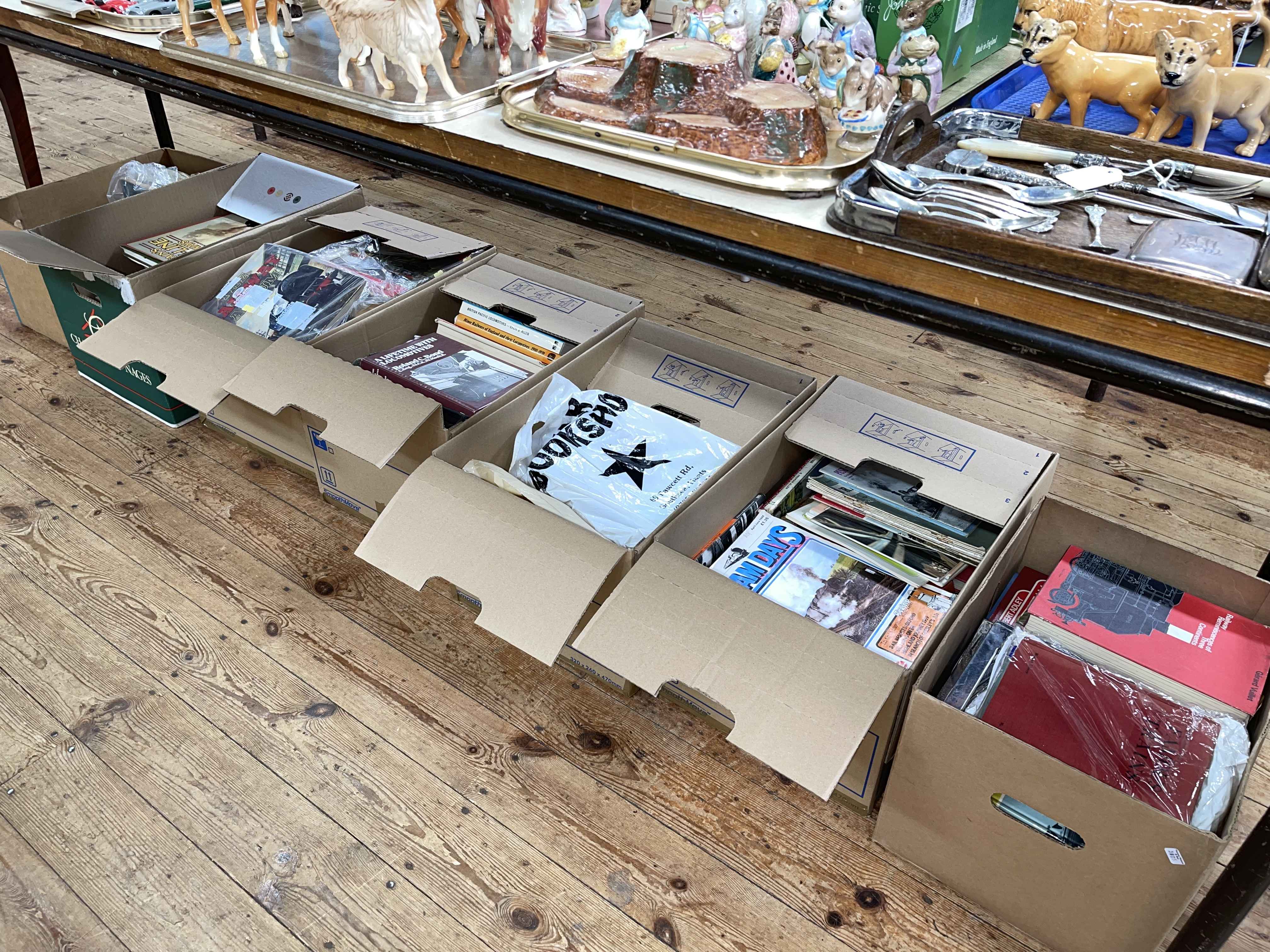 Seven boxes of railway books.