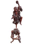 Chinese root carving of an Oriental man dancing, 70cm high.