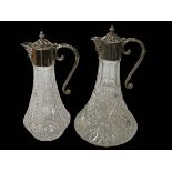 Two silver plate mounted claret jugs.