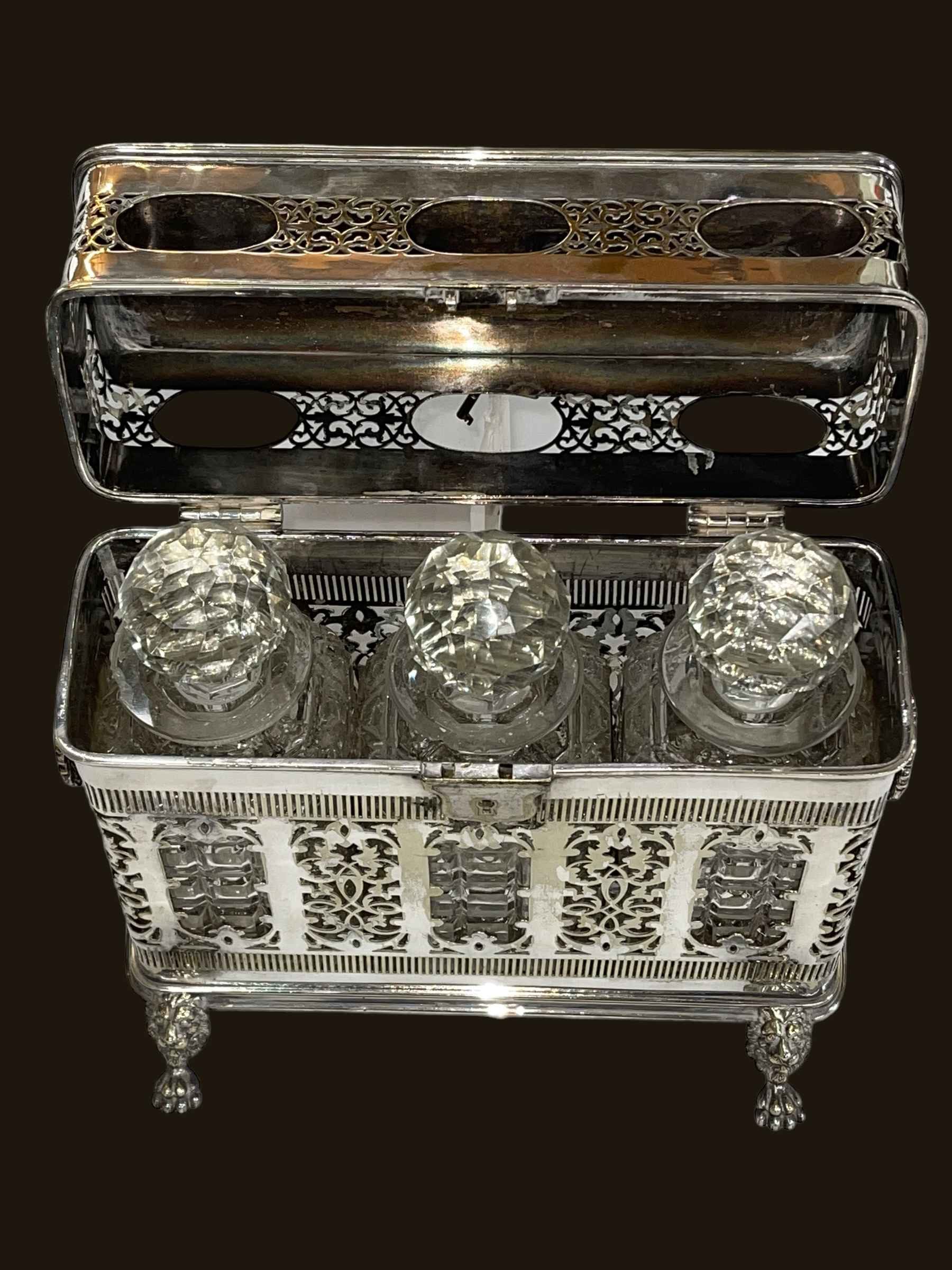 Ornate Sheffield plate engraved decanter box raised on four lion mask and paw feet, - Image 2 of 2