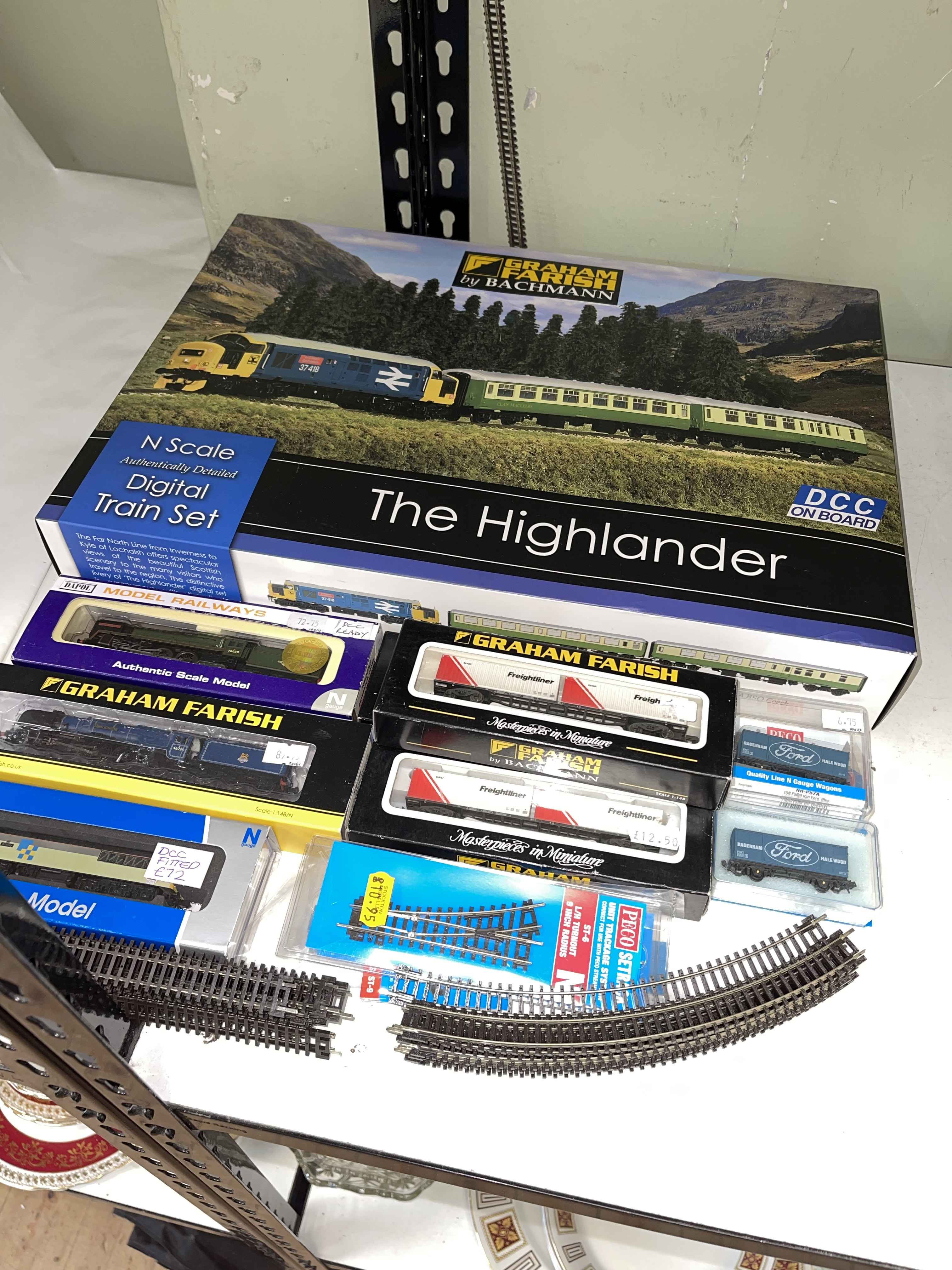 Collection of train carriages and models including Graham Farish, Dapol, etc.