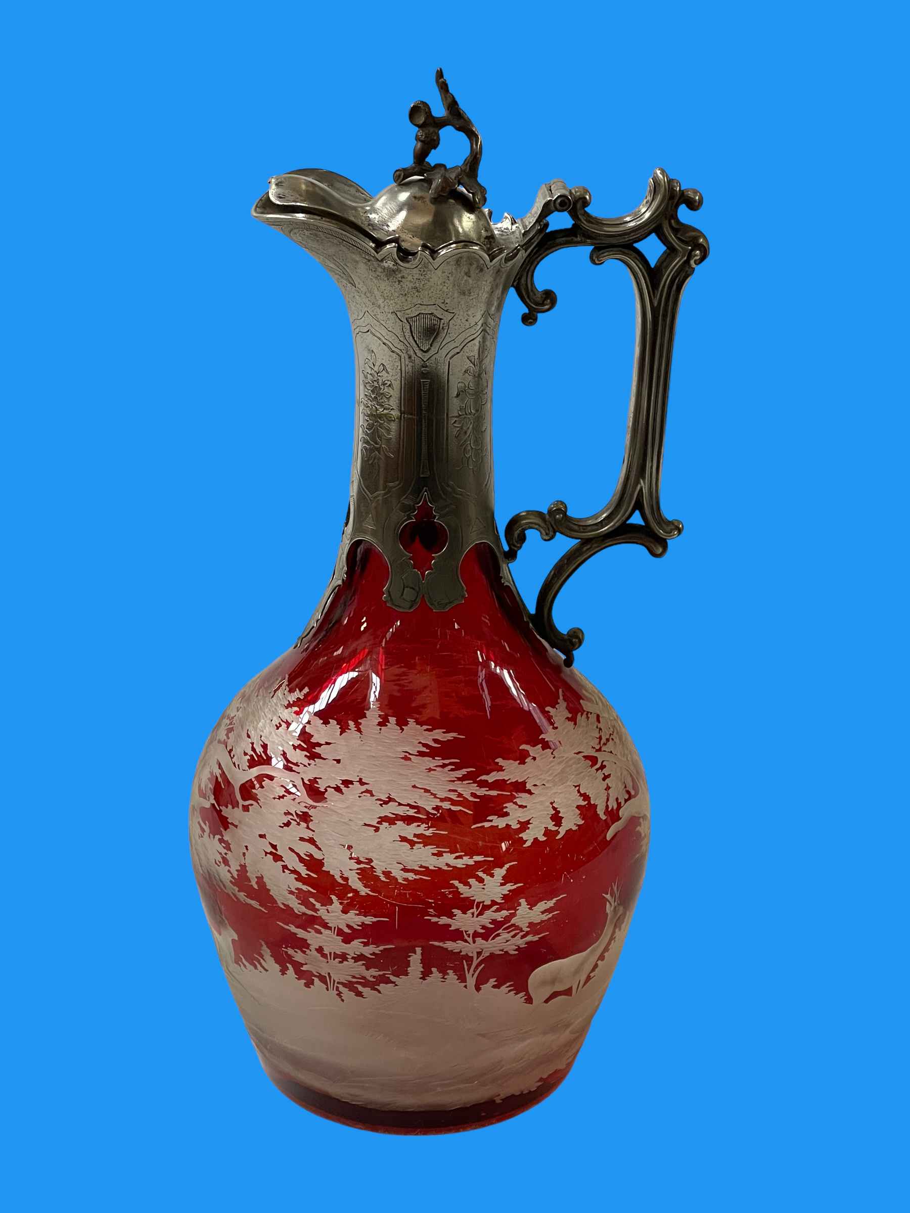 Bohemian ruby overlay glass claret jug with silver plated mount, 28cm high.