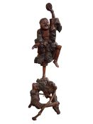 Chinese root carving of an Oriental man dancing, 70cm high.