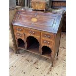 Edwardian inlaid mahogany bureau, the fall front above five drawers with open compartments below,