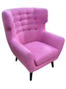 Contemporary pink and multi-coloured button back wing chair.