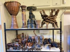 Collection of Ethnic wood carvings, drums, masks, elephant stool, CD stand.