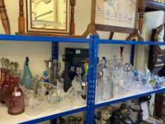 Good collection of clear and coloured glass including glass decanters, glass clowns, paperweights,