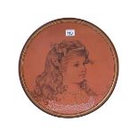 Torquay Ware terracotta portrait plaque signed Victoria Sevin, 36.5cm diameter.