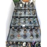 Collection of Lord of the Rings figures with stands.