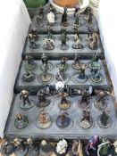 Collection of Lord of the Rings figures with stands.