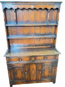 Period style oak shelf back dresser, 166cm by 107cm by 33cm.
