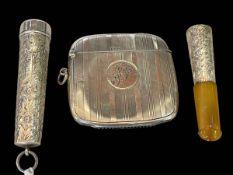 Silver mounted cheroot holder and ornate case, and silver vesta (2).