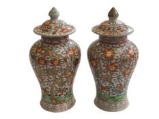 Pair Chinese baluster vases and covers, 21.5cm.