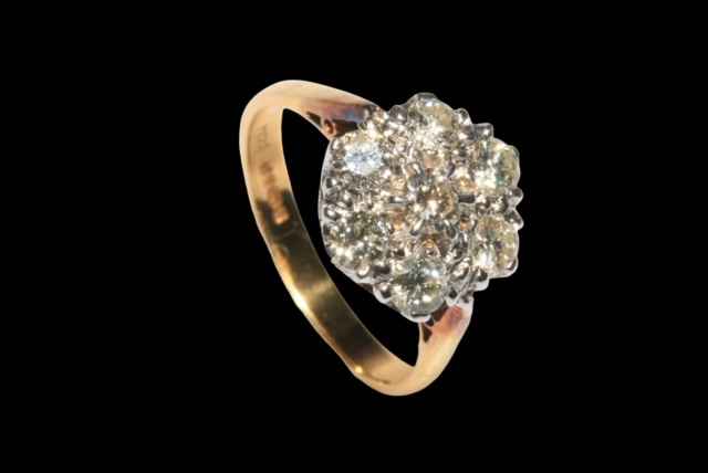 Seven stone diamond petal design ring, the diamonds claw set in white gold to yellow gold shank, - Image 2 of 2