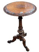 Victorian circular mahogany tripod occasional table with carved border, 69cm by 45cm diameter.