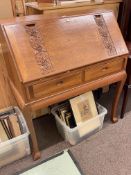 Oriental style carved hardwood two drawer bureau, 107.5cm by 95cm by 48cm.