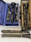 Boosey & Hawkes Regent clarinet in case, and two vintage clarinets.