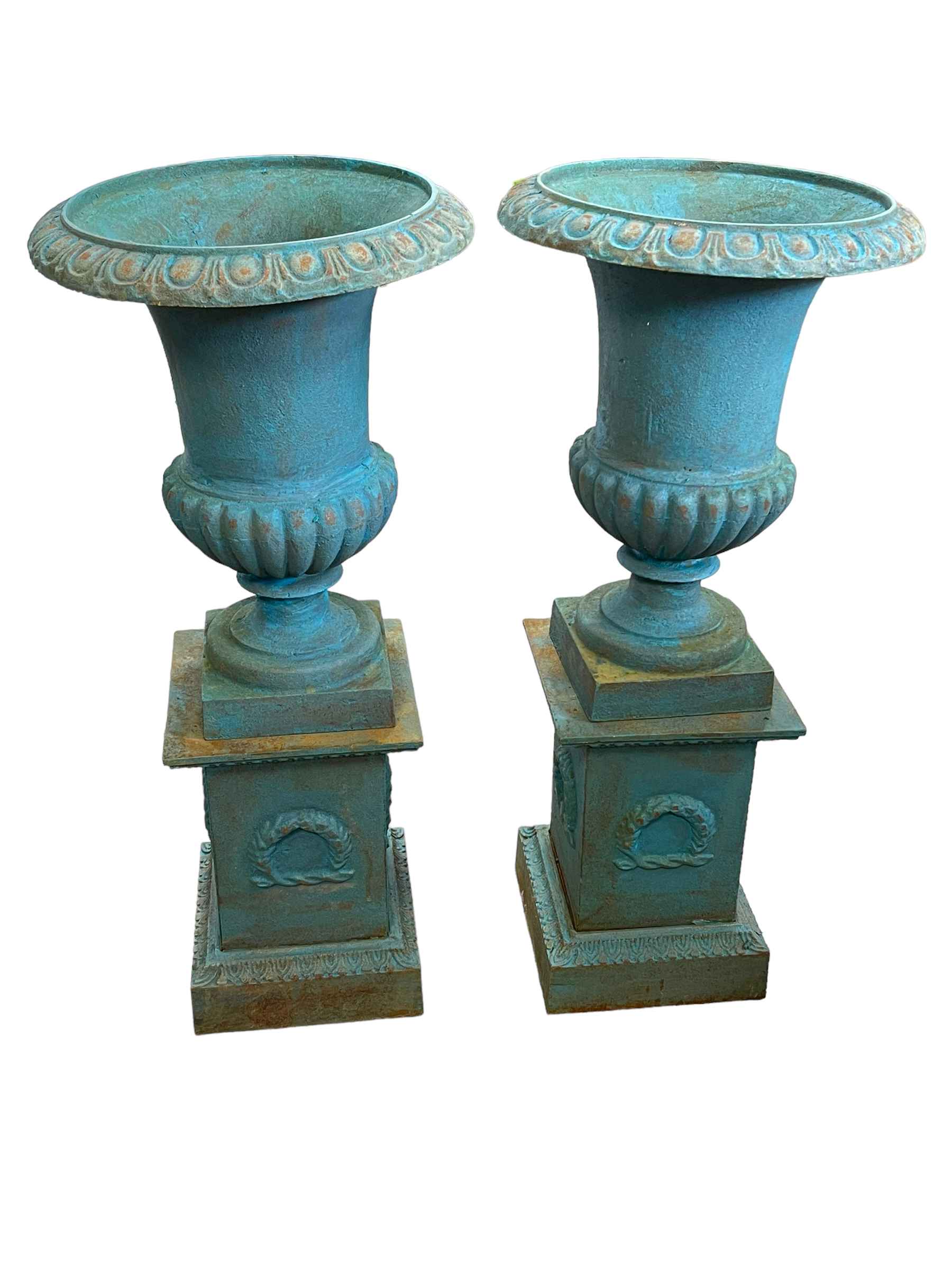 Pair cast Campana style garden urns on stands, 75cm by 34cm diameter.