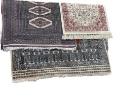 Three various Persian design rugs, largest 1.80 by 1.25.