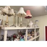 Full shelf of vases, planters, table lamps, toilet jugs and bowls, ginger jars, steins, etc.