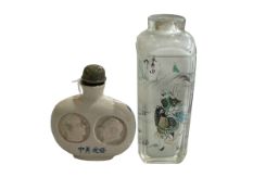 Chinese crystal snuff bottle, signed Yong Smou Tien, and another with portraits and flags (2).