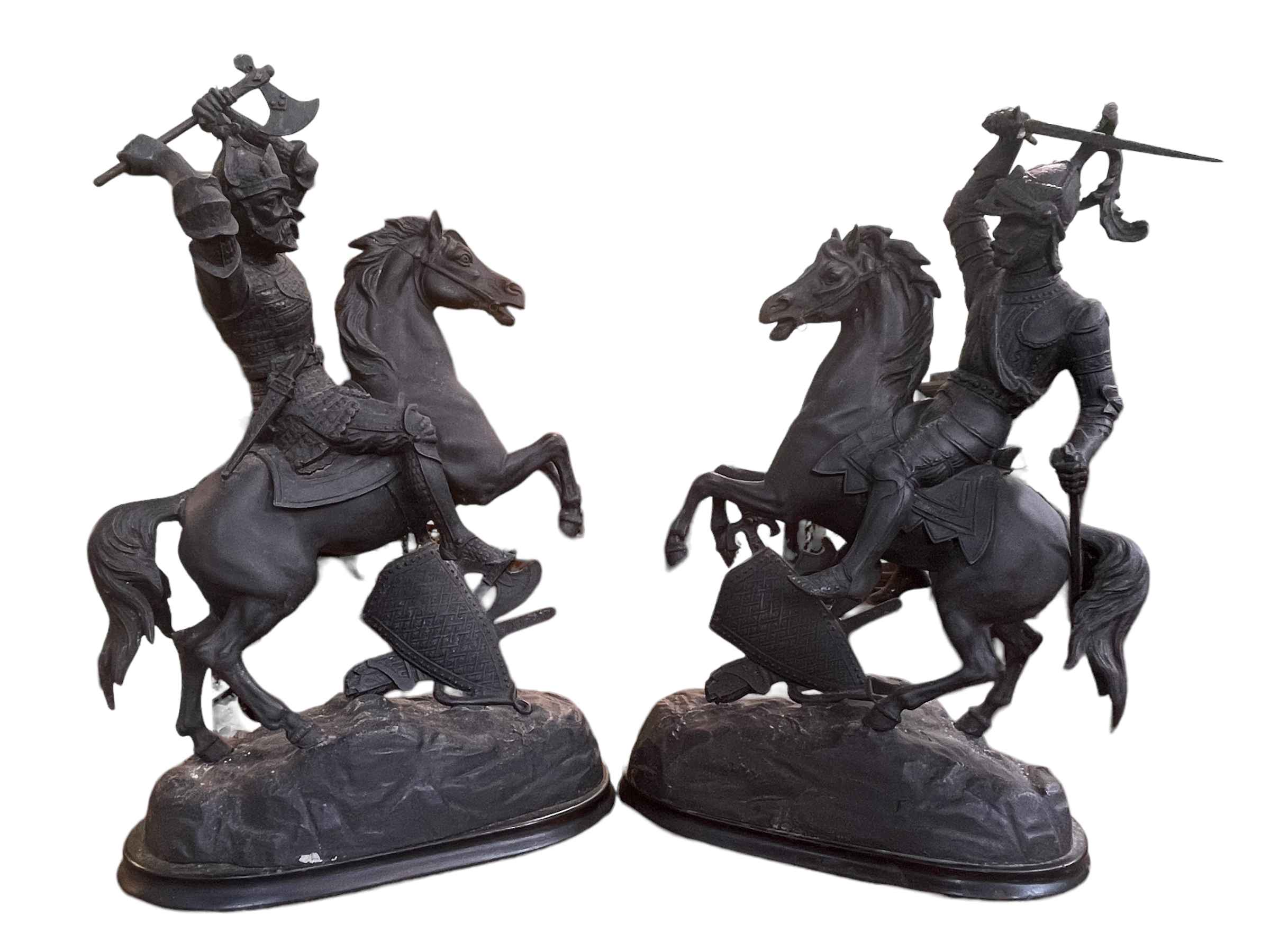 Pair of spelter warriors on horseback, 52cm high.