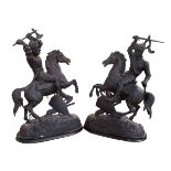 Pair of spelter warriors on horseback, 52cm high.